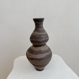 Duality of Stone II vessel